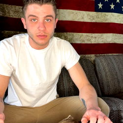 AAxxton, a Young Man Posing with His Dog in a Casual Setting