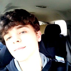 A Young Man in a Car