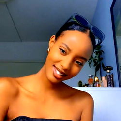 Smiling Model Afri with Elegant Dark Sunglasses and Black Top