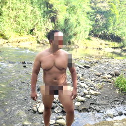 Nudist Hunter in Outdoor Setting