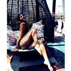 Model Relaxing on Swing in Pool Area
