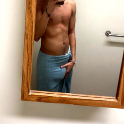 Macguy Mirroring His Shirtless Body in a Bathroom Mirror