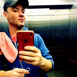 Marcos Daddy, Model, Taking a Selfie in an Elevator