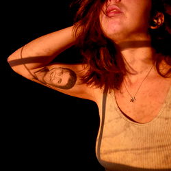 Autumn Model: A Young Woman with a Tattoo