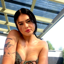 Model in Swimsuit by Pool