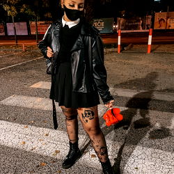Andyzer in a Stylish Gothic Outfit at Night