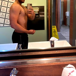 Muscular Man in Bathroom