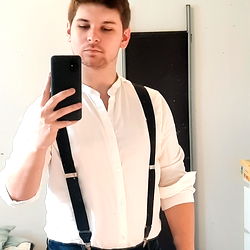 Sophisticated Vintage Style Model Poses with Smartphone