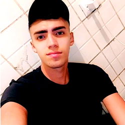 Young Man in Black Shirt and Cap