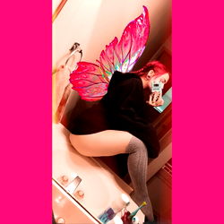 Model in Fairy Costume on Bathtub