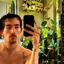 Acat With Agat: A Striking Tattoo Model Shows Off His Ink and Style