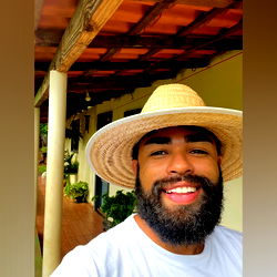 Amaro, the Man with a Wide Smile and Hat