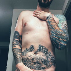 Inked and Shirtless: Aaron's Tattoo-Covered Body