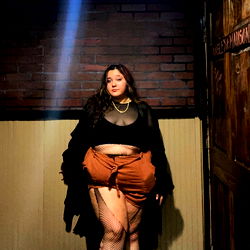 Isa, the OnlyFans Model Standing in a Bar