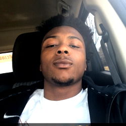 Meechie in a Vehicle