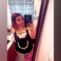 A. in Schoolgirl Uniform