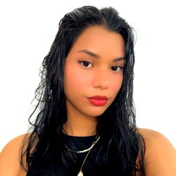 A Model Photograph with a Young Woman Posing for an OnlyFans-Themed Shoot.