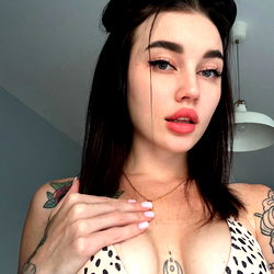 Elena❤️, a Stunning OnlyFans Model with Bold Tattoos