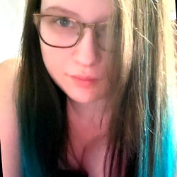 Stylish Woman with Long Hair and Blue Dye