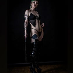 Elegant OnlyFans Model in Stylish Gear,