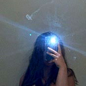 OnlyFans Model in a Bathroom Mirror