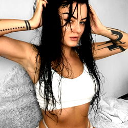 Kira, OnlyFans Model: Sensual Pose in Lingerie with Black Hair