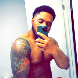 Fit and Tattooed Male Model