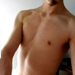 Fit Model Showcasing Abs in Selfie