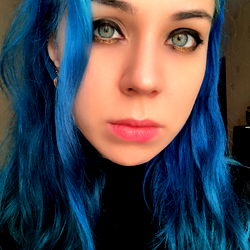 Stylish, Long-haired Woman with Blue Hair and Gold Eyes, Age 25