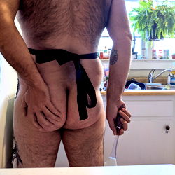 A Cheeky Surprise: A Man Dressed in Lingerie for His Significant Other