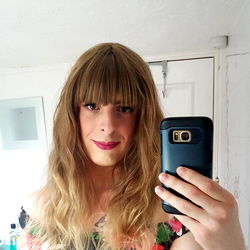 A Blonde Model in a Flowery Dress