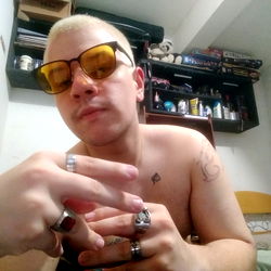 OnlyFans Model Adam Douglxs in Shades, Awaiting Fan Engagement?