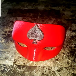 Vivid Playboy Mask Against Backdrop of Poker