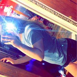 Person in Mirror Reflection