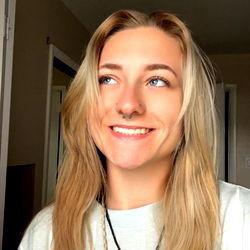 Amber, a West Palm Beach model with a bright smile and relaxed style, poses for the camera in her home.