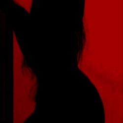 Intense Red Silhouette of a Female Dancer