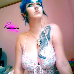 OnlyFans Model KawaiiCorruption in a Floral Print Dress