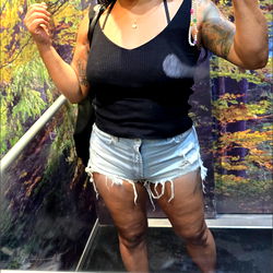 OnlyFans Model Taking a Selfie in a Mirror