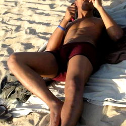 Sultry Summer Vibes: A Model Relaxing on a Beach