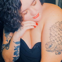 Olivia Olsen in a black dress