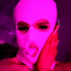 Masked barbi, a striking OnlyFans model in an unmasked state