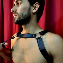 André Latin, OnlyFans Model from Argentina - A Bold and Captivating Portrayal in Red Background