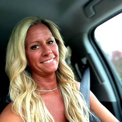 Liv's Smiling Pose in Car