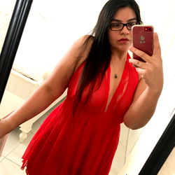 Alma in a Red Dress Taking Selfie