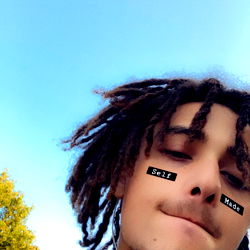 Introspective AkBabyJ in a Blue Shirt