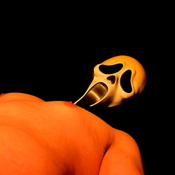 Scream Mask on Back of Shirtless Model