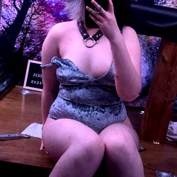 Fashionable Plus Size Model Striking a Pose on a Chair