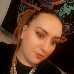 Tattooed Individual with Painted Toes