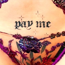 Tattoo artist showcasing body art