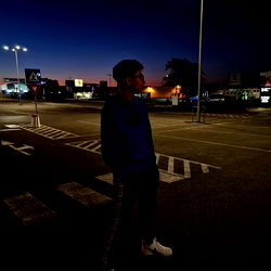 Adi Pascu in Parking Lot at Dusk